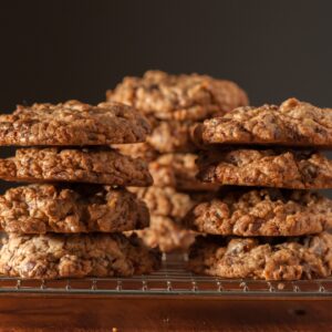 Chockfull Of Everything Cookie stacked on top of cooling rack