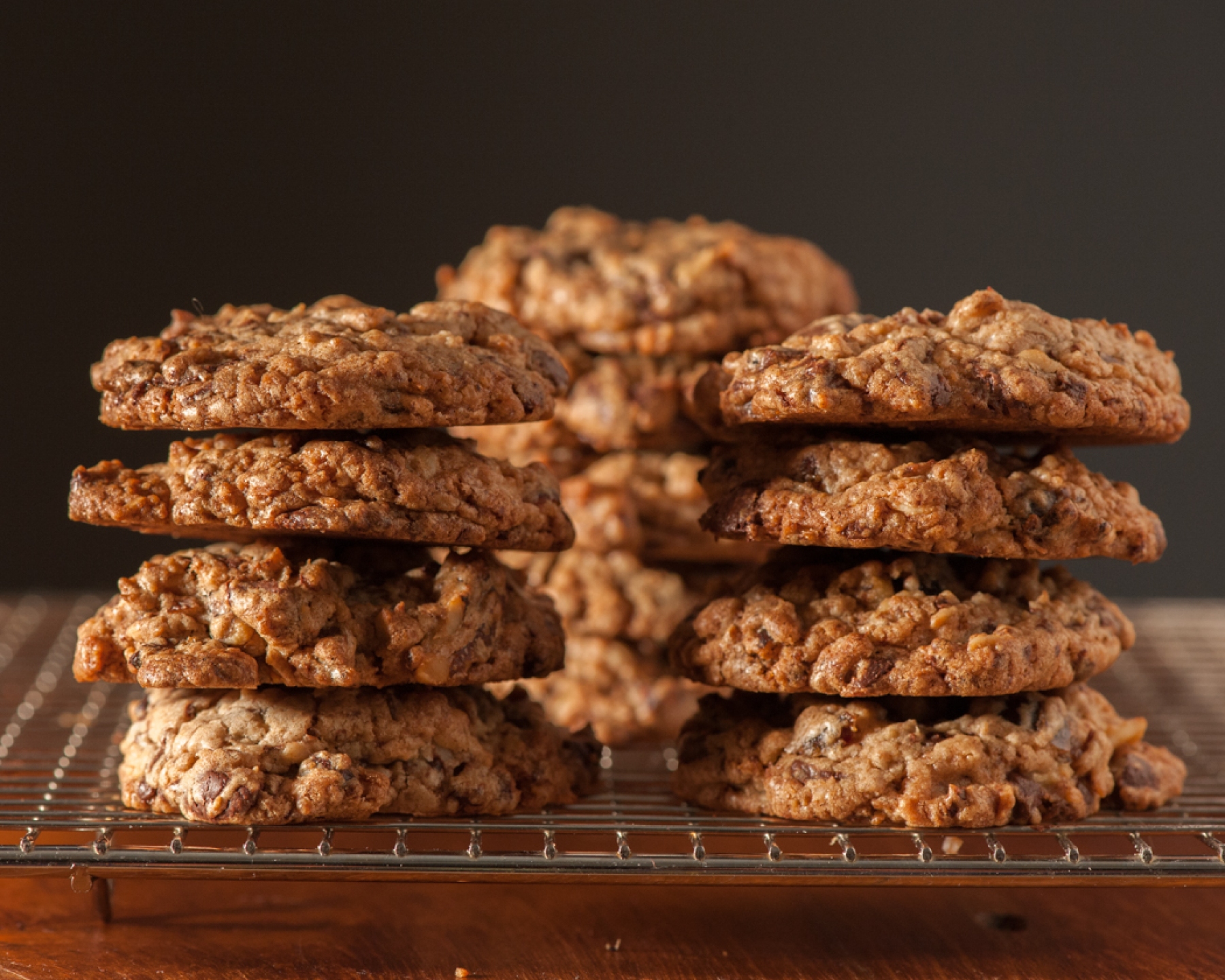 Chockfull Of Everything Cookie stacked on top of cooling rack