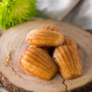 Maple Madeleines placed on wooden log cutting board