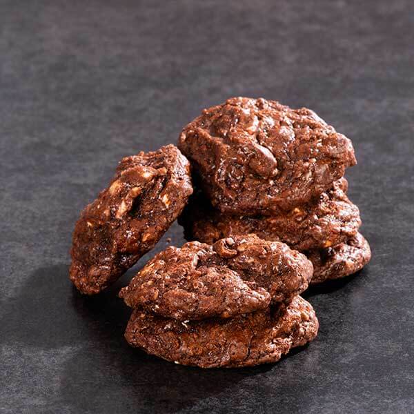 stacks of chewy chocolate rum raisin cookies