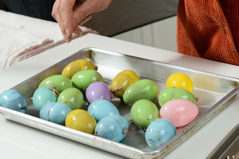 Plastic eggs filled with chocolate marshmallow batter.