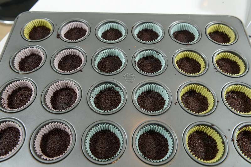 See chocolate wafer crust pressed into the cups.
