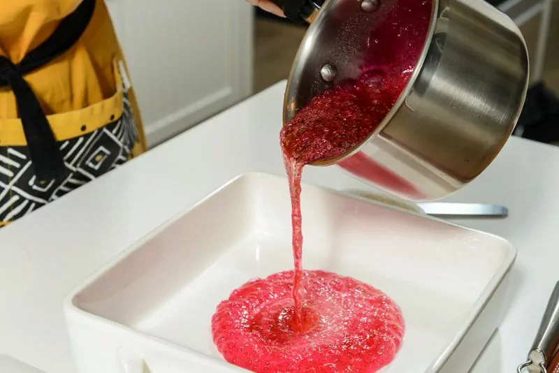 Cool the hot sugar by pouring it into a shallow dish.