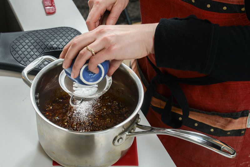 Add the baking soda after the sugar at the correct temperature.