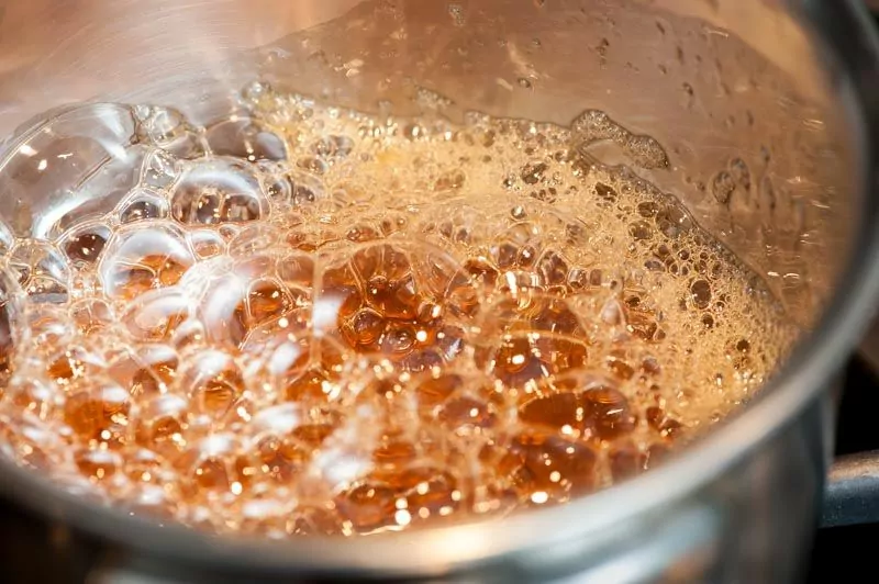 Heating the honey to 257ºF.