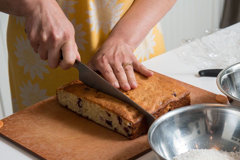 Cutting the cherry cake.