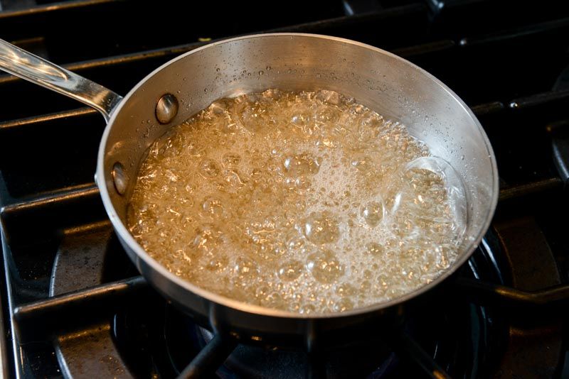 Cook the sugar for the meringue.