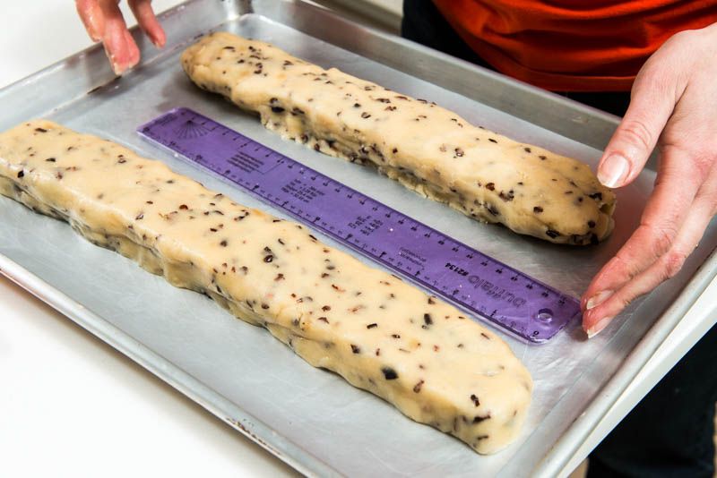 Shape the cookie dough evenly to produce cookies all the same size.