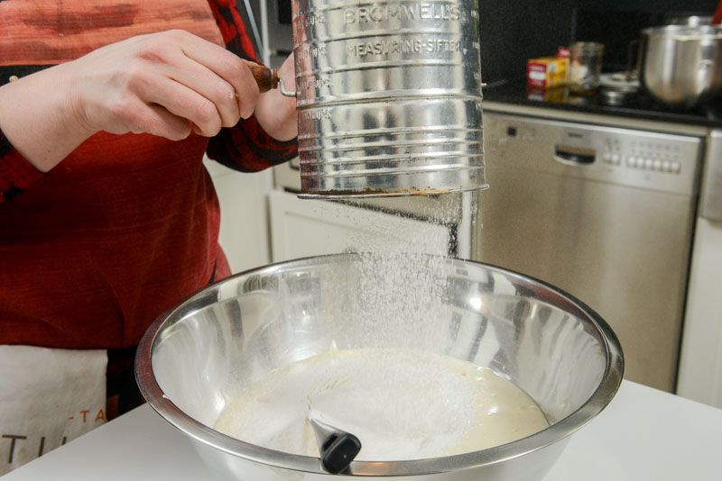 Sift flour into the egg foam.