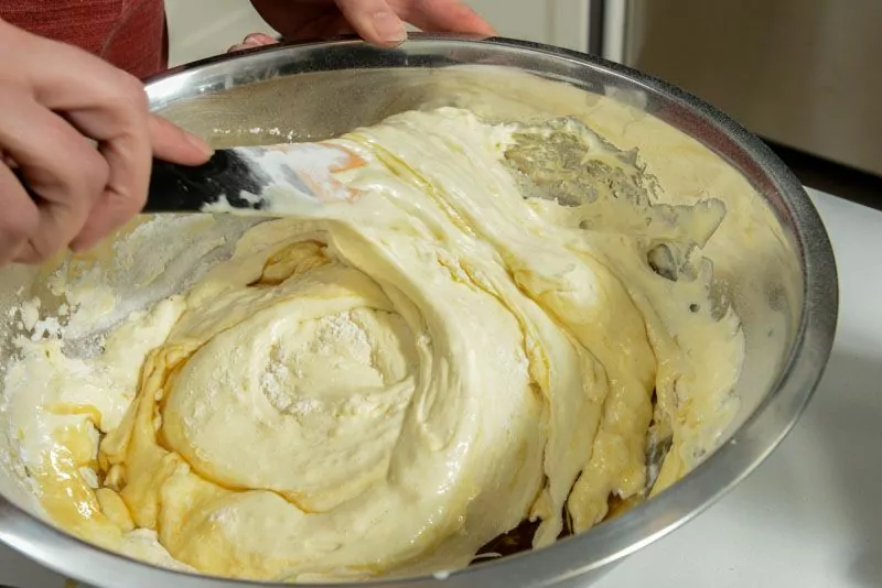 Fold the butter, maple syrup, and remaining flecks of flour.