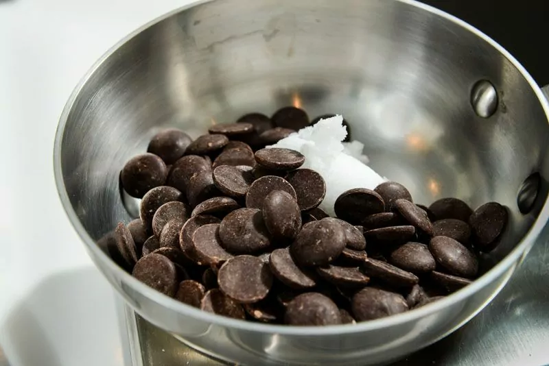 Coconut oil softens the dark chocolate a little when it cools.