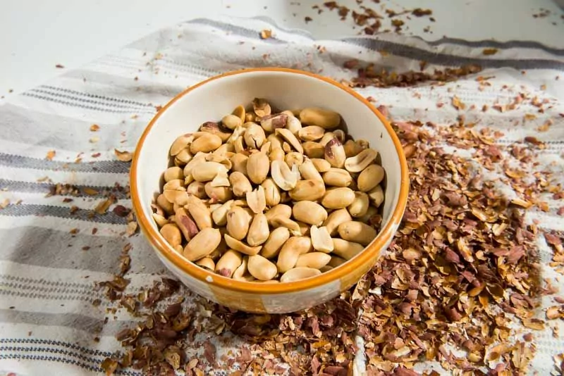 Removing the bitter peanut husks make a better tasting cookie.