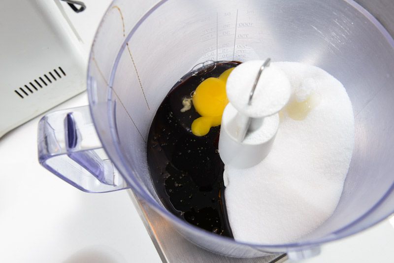 Weighing molasses, egg and sugar in the food processor.