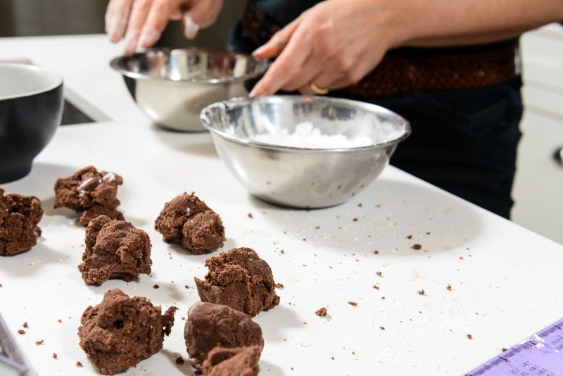 Broken pieces of cookie dough waiting to be rolled and baked.