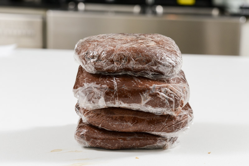 Cookie dough wrapped in individual sections and stored in the fridge