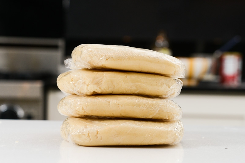 Cookie dough wrapped in quarters ready for the fridge.