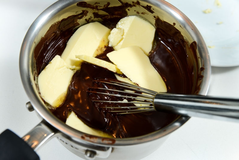Adding butter is the final step to making the chocolate ganache.