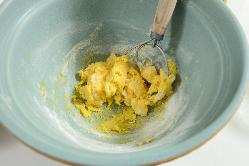 Mix the noodle dough by hand or in a stand mixer.