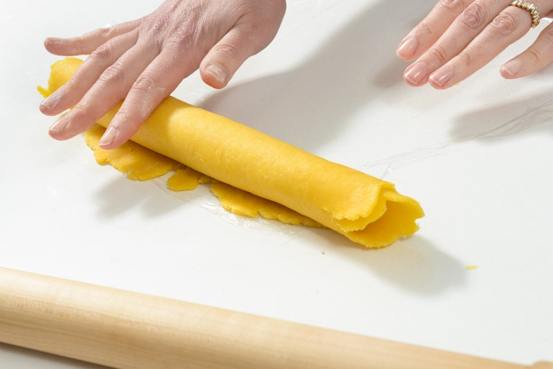 Roll the noodle dough for easier cutting.
