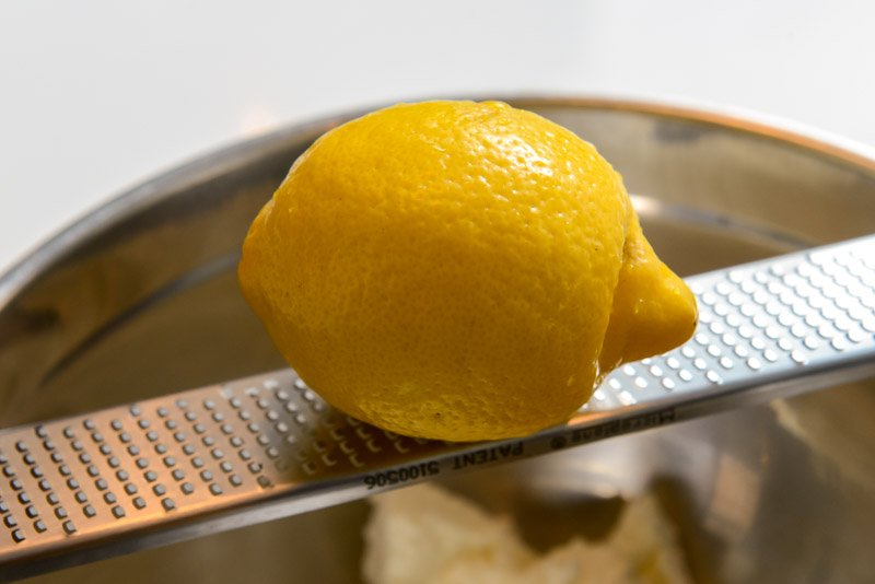 Zest a lemon.