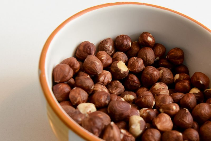 Whole hazelnuts.