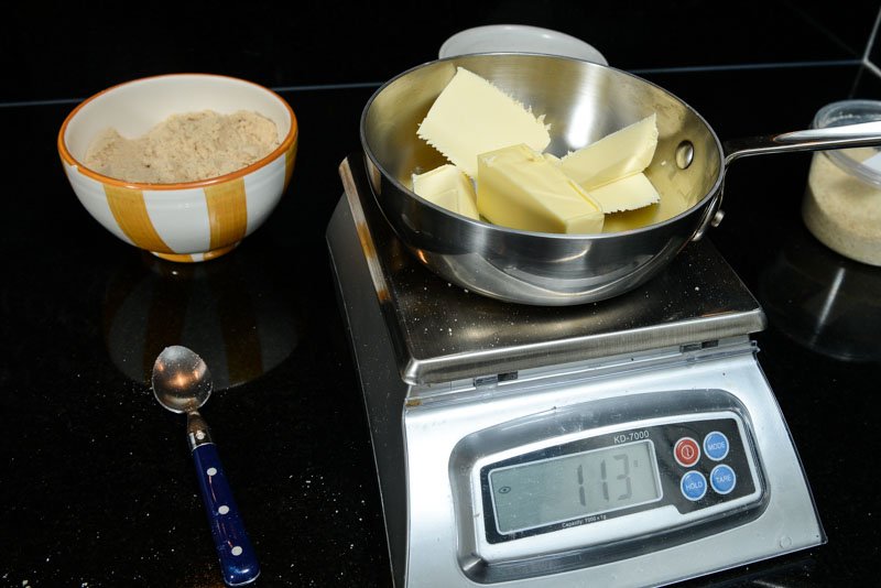 Measuring the butter for mise en place.
