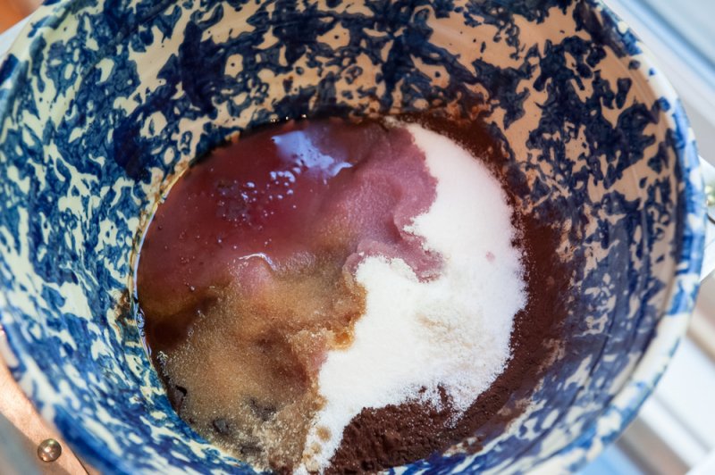Cocoa, salt, sugar, wine and vanilla in a mixing bowl.