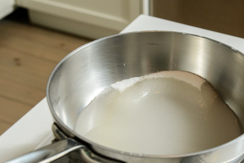 Sugar dissolving in water for the syrup.