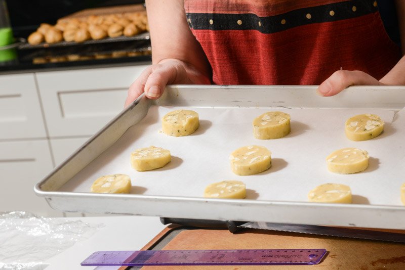 Sliced cookies on the sheet ready for the oven.