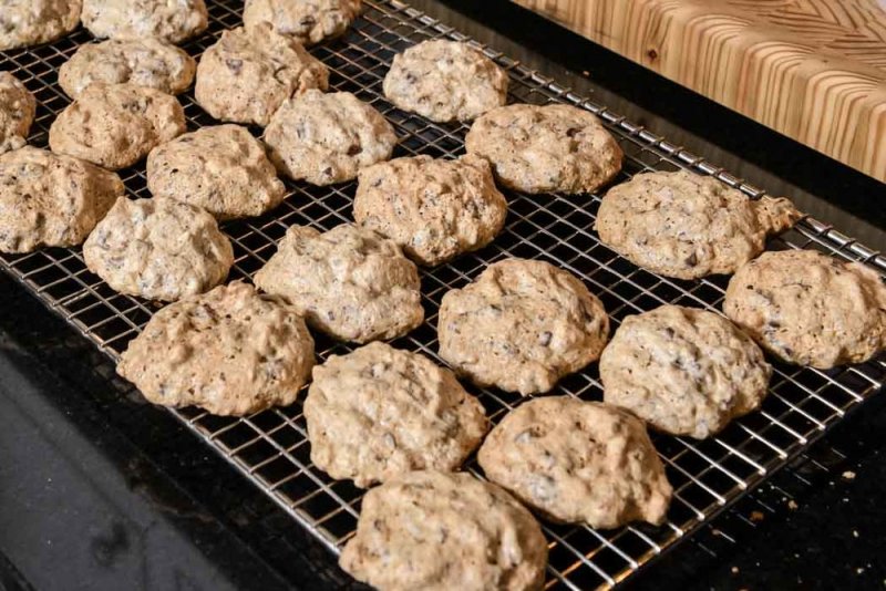 Hazelnut chocolate meringue cookie batter (Brutti ma Buoni) cooling on the rack.