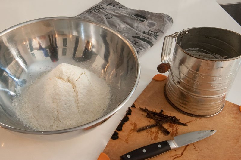 Almond flour and powdered sugar sifted in a wide bowl.