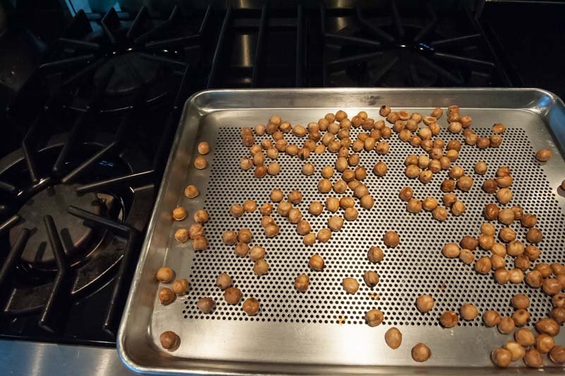 Toasting skinned hazelnuts.