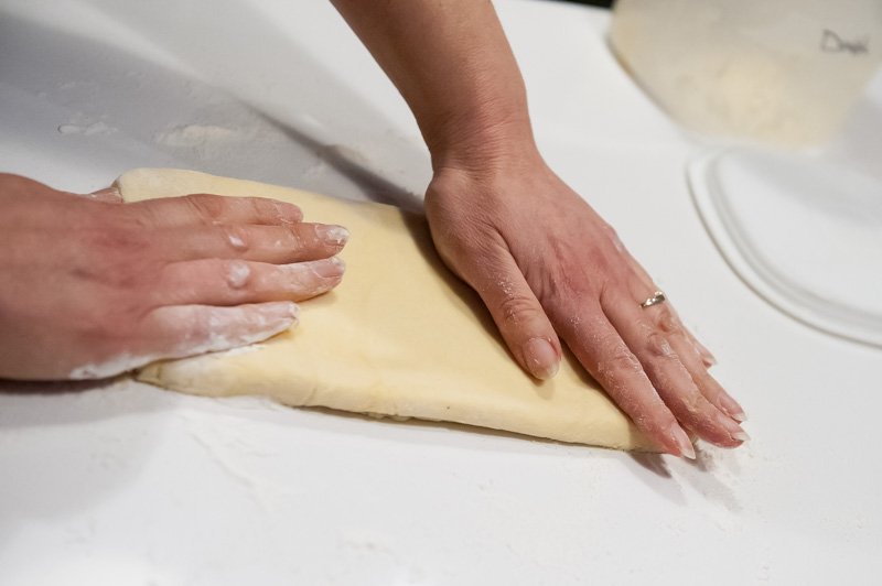 Getting ready to make the biz folds for the brioche dough.