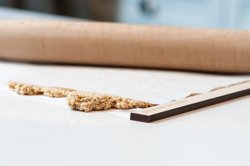 The Sesame Seed Nougat being rolled to 1/4 inch thick.