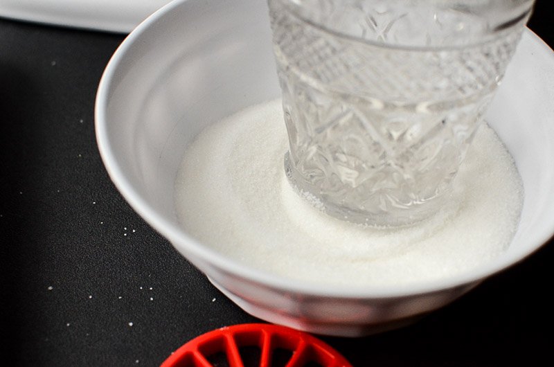 Dip the press into sugar to keep it from sticking.
