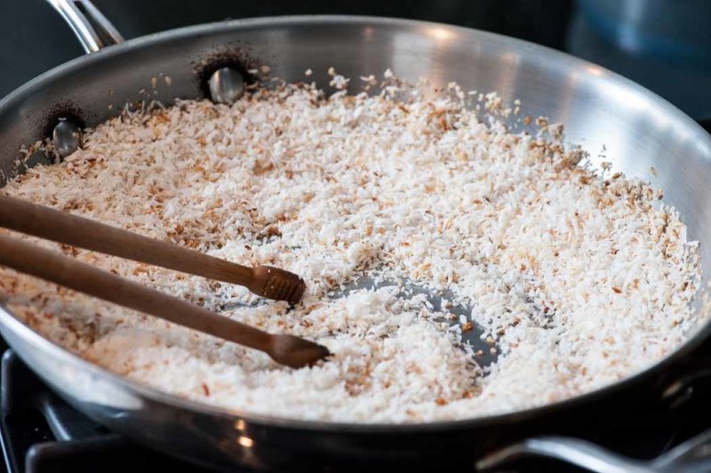 Toasting coconut.