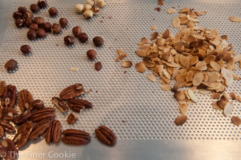 Almonds, hazelnuts and pecans after they have been toasted.