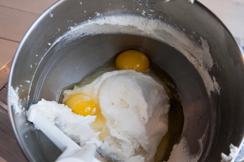 Eggs added to the beaten butter, shortening and sugar.