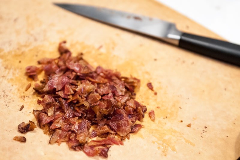 Chopping the bacon.