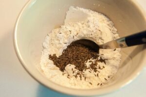 Add the toasted caraway seeds into the dry ingredients.