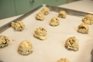 12 cookies are too many for the tray. They spread quite a bit when they bake. 9 is better.