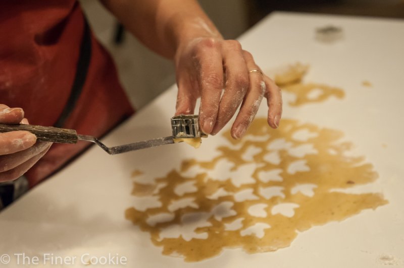 Cutting the cookie dough.