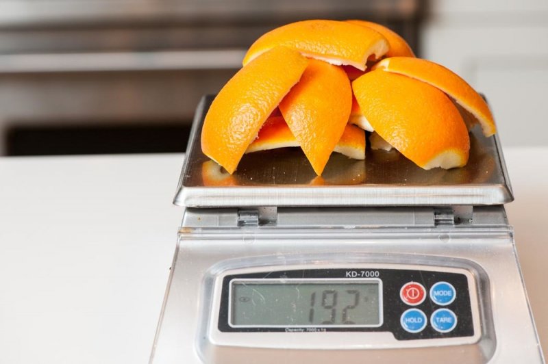 Weigh the orange rinds.