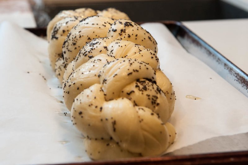 The Challah just glazed with poppy seeds.