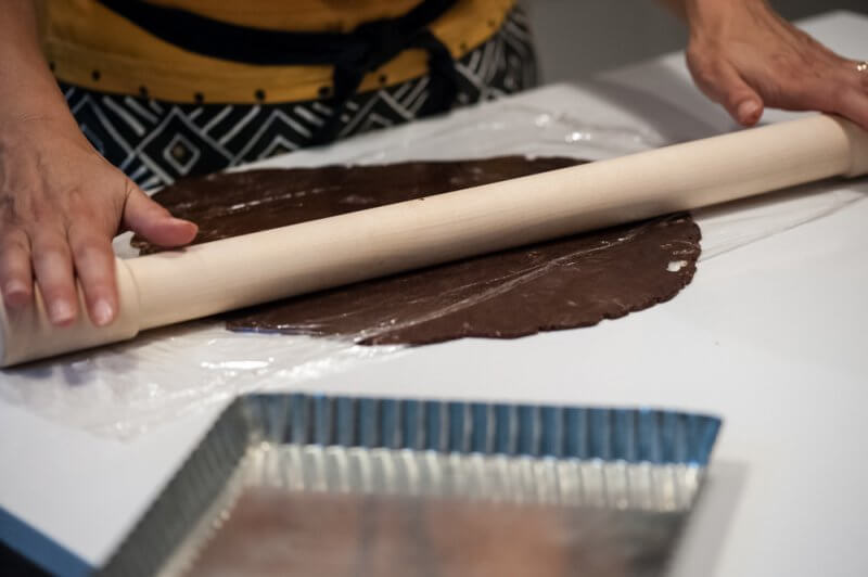 Rolling out the crust for the pie plate.