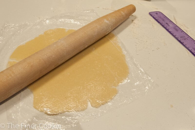 Using plastic while rolling out the dough is a good idea.