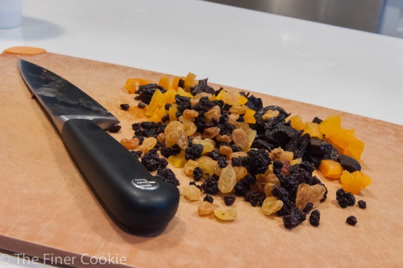 Chopped dried golden raisins, apricots, prunes and black currents before they are soaked.
