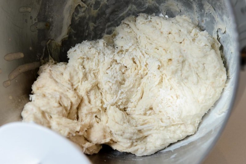 The flour blanket being pushed up by the dough starter.