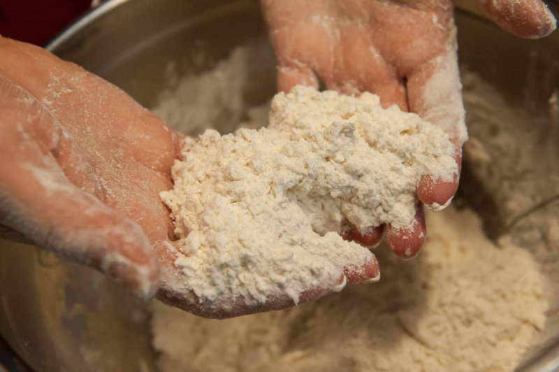 Cream cheese worked into the flour mix.