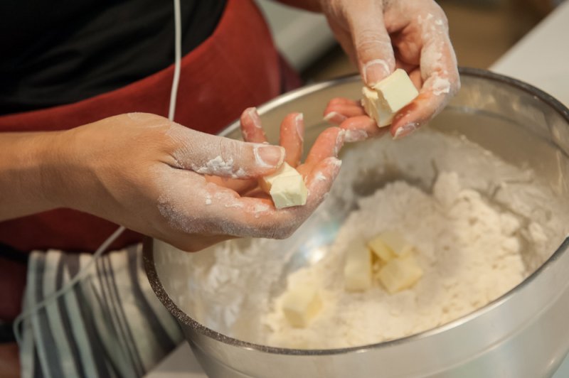 Work the flour into the butter. with your hands.